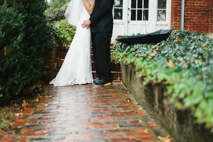 Kelley anniversary photoshoot on rainy autumn fall day with umbrella at Mary Baldwin College on the Terrace