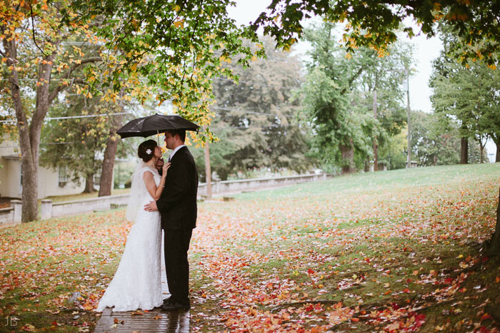 Kelley anniversary photoshoot on rainy autumn fall day with umbrella at Mary Baldwin College on the Terrace