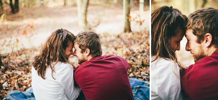 engagement session in the woods, surrounding a fire with smores and flannel in autumn