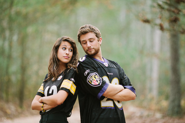 engagement session in the woods, surrounding a fire with smores and flannel in autumn