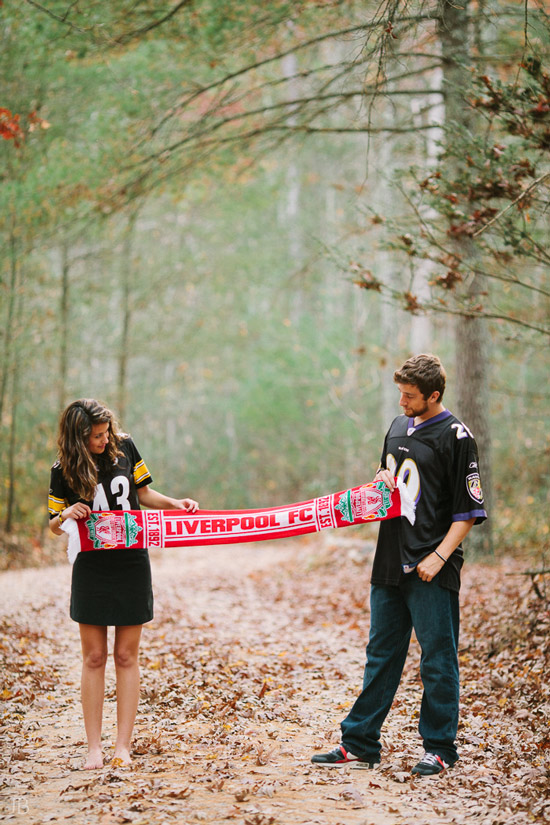 engagement session in the woods, surrounding a fire with smores and flannel in autumn