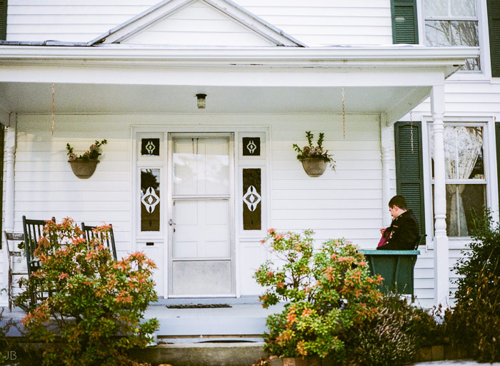 fuji 400h military couple in uniform with letters they wrote to each other 1950s farmhouse engagement photo shoot