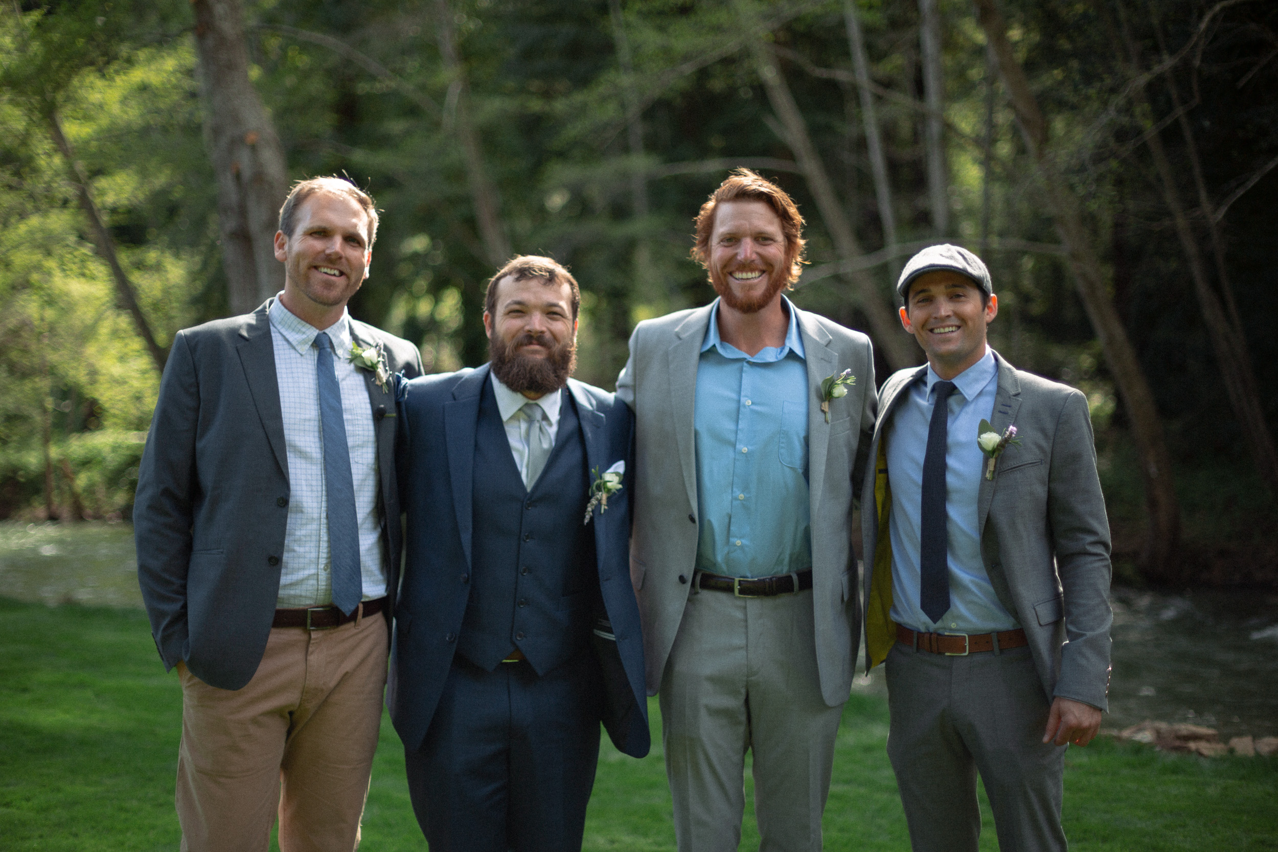 groomsmen group portrait next to big sur river - - big sur california wedding - laid back wedding in big sur california - true to life colors