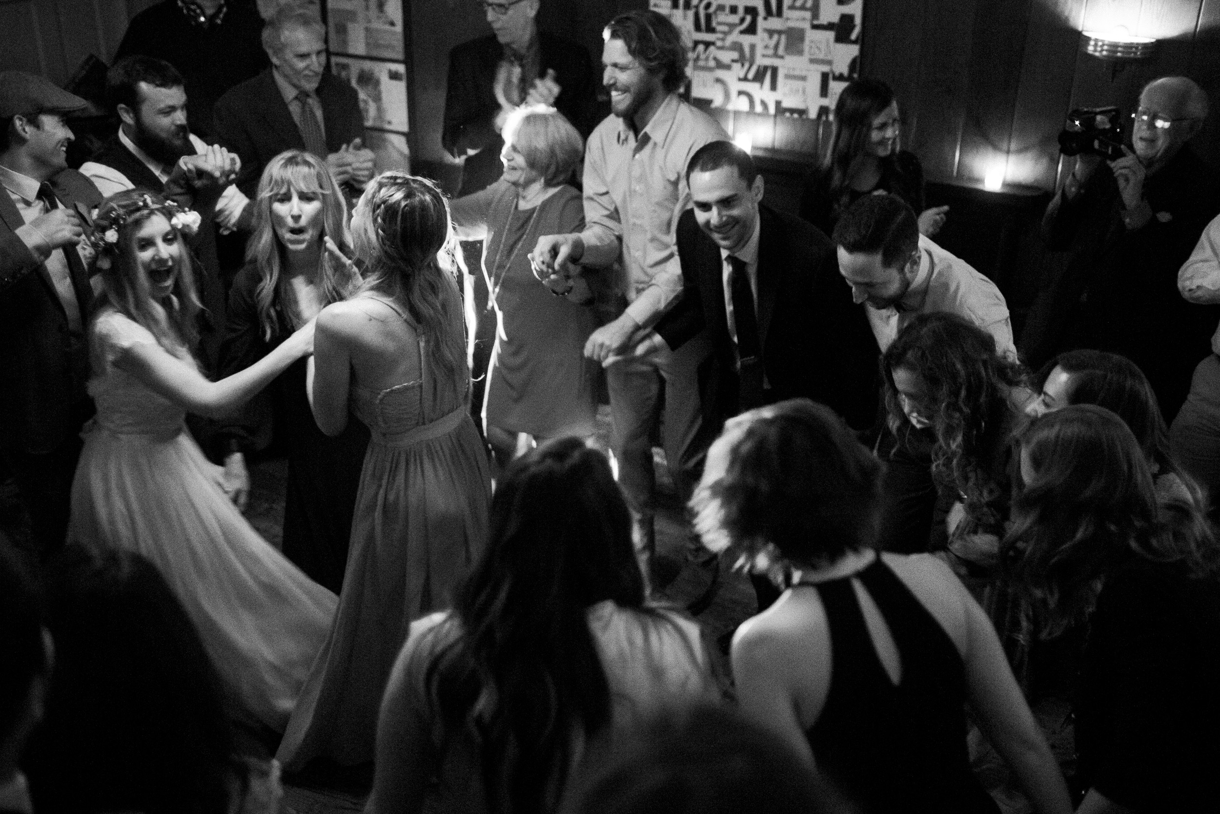 fuji acros black and white wide angle view of dance floor at big sur bakery wedding reception - documentary photographer in california