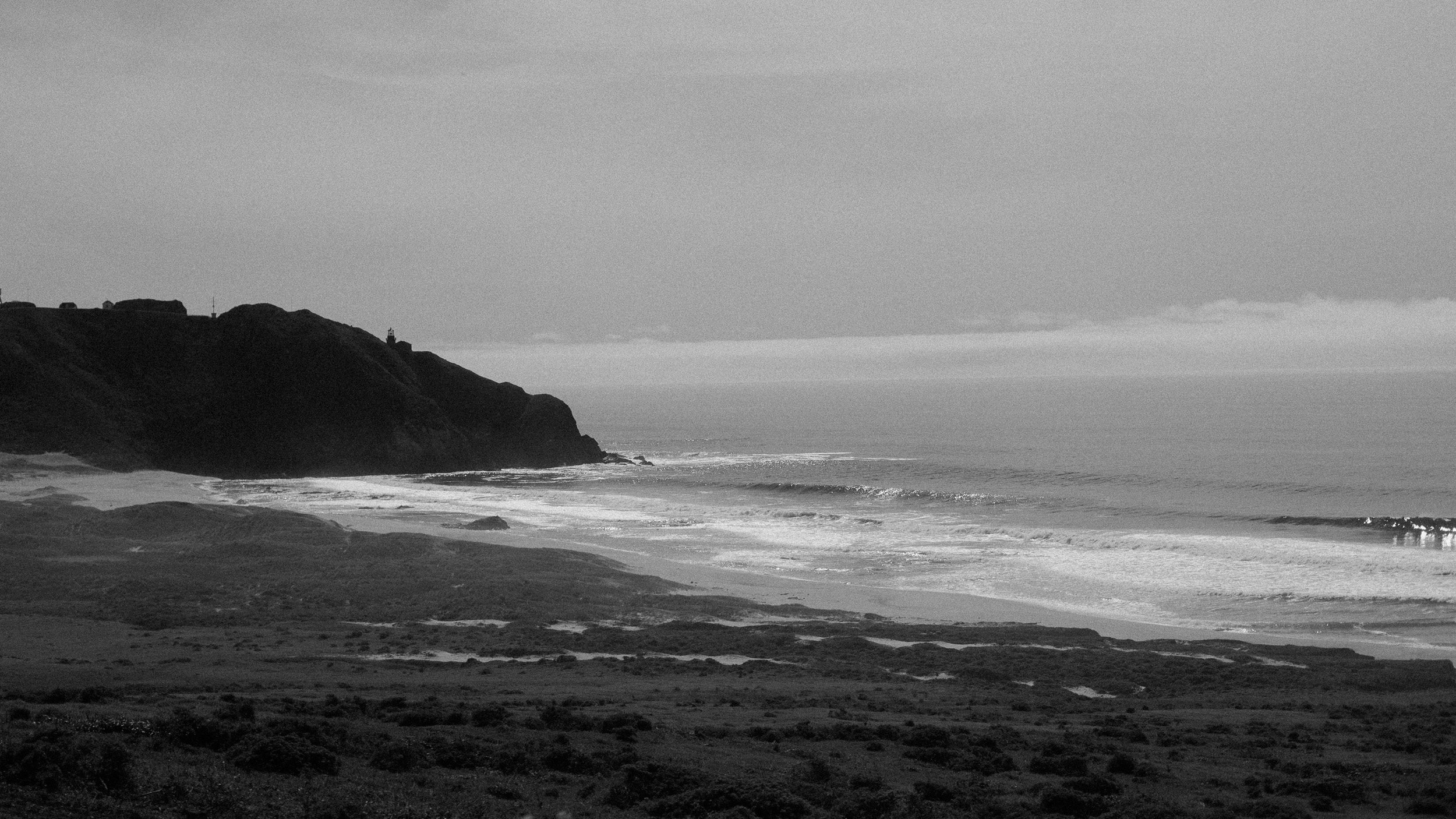 panorama of pacific ocean at big sur - fuji acros black and white film simulation