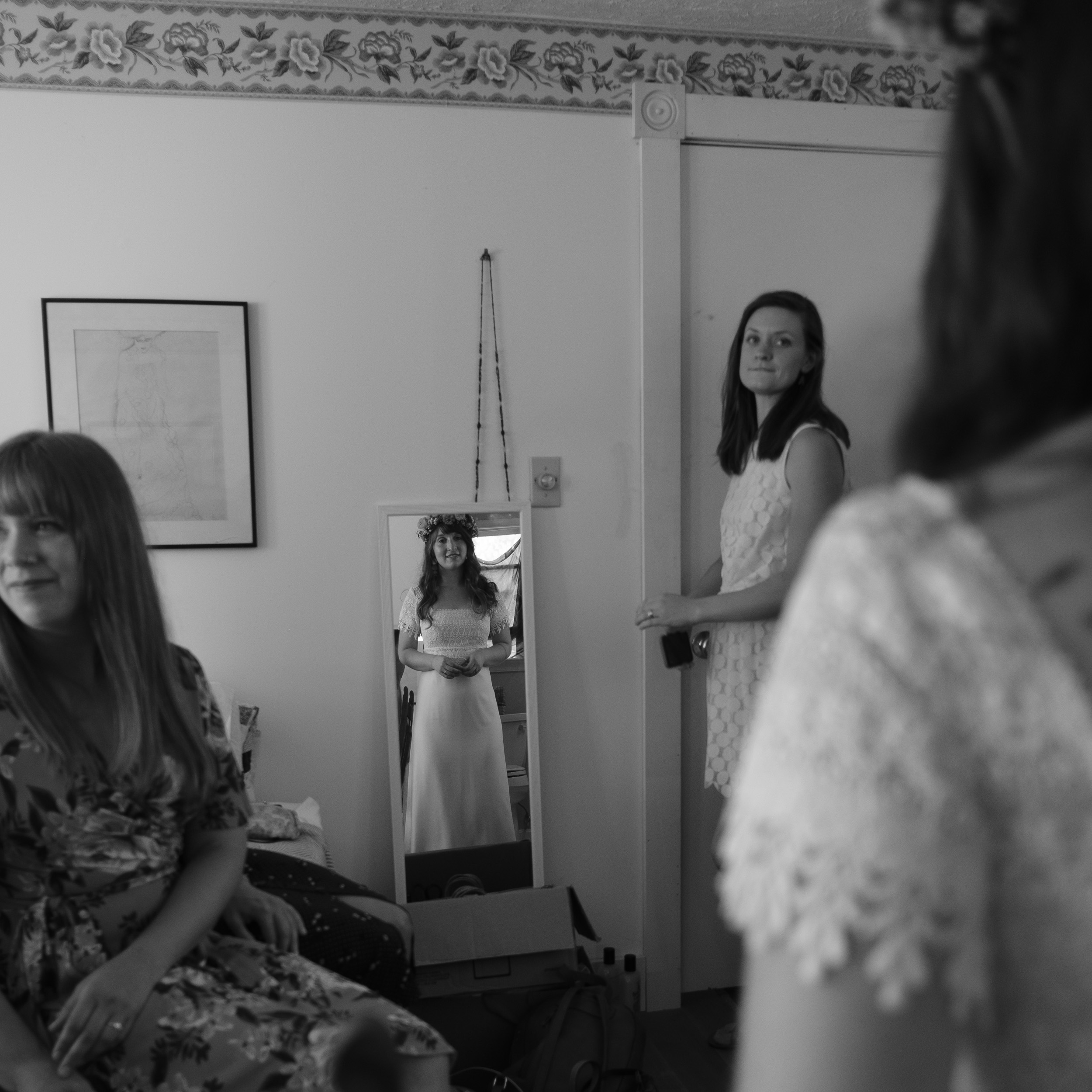 bride getting ready looking in mirror in farmhouse in Virginia - Fujifilm Acros black and white film look