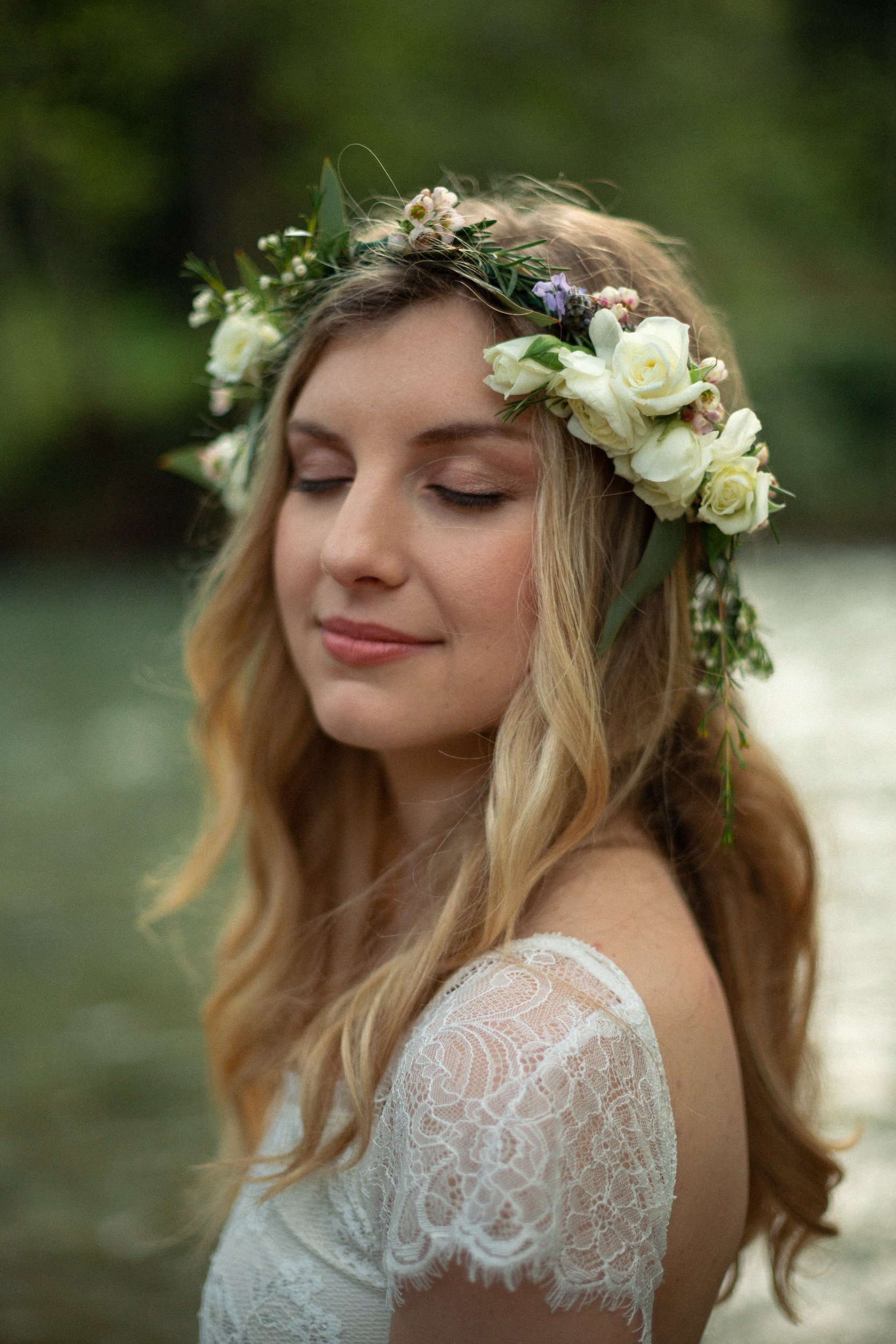 bride portrait with eyes closed next to big sur river - big sur california wedding - laid back wedding in big sur california - true to life colors