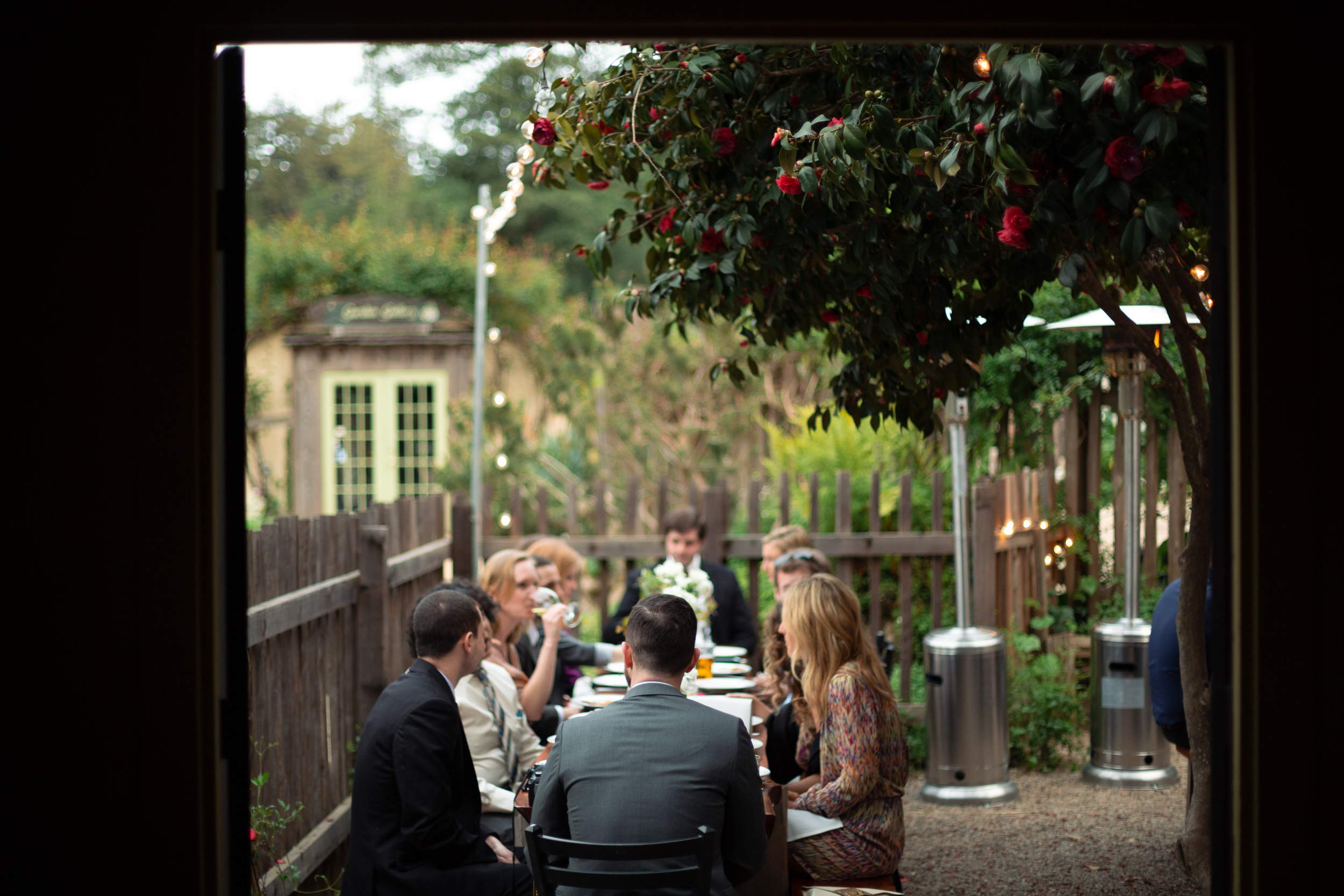 guests enjoy cocktail hour at big sur bakery  - big sur california wedding - laid back wedding in big sur california - fuji provia film look true to life colors